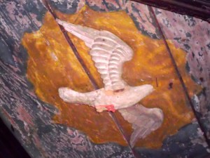 Monbos, kerkje uit de 11e eeuw, pre christenlijke afbeeldingen, heidense kerk