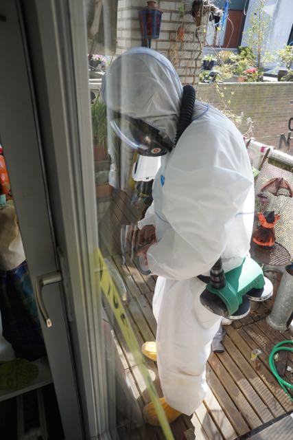 asbestwagen,HEMUBO, milieutechniek, astronaut, verwijderen van asnest, asbest team, man in wit pak, 